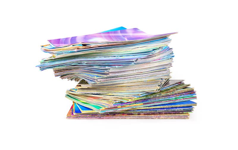 Stack of colorful magazines on white background