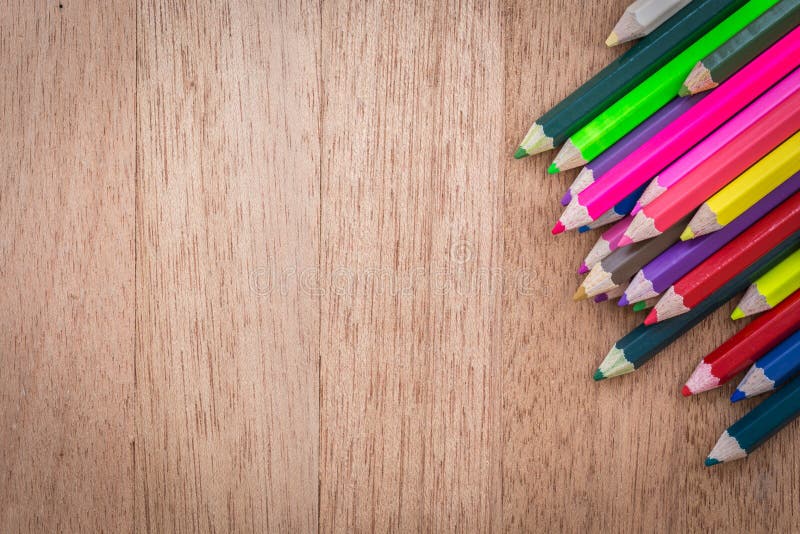 Stack colour pencils on wooden background royalty free stock photo Stack colour pencils on wooden background royalty free stock photo