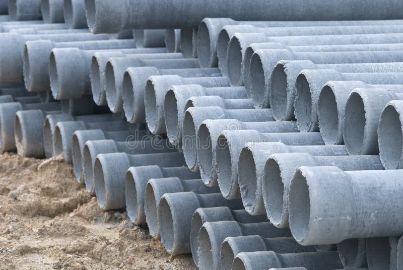 Stack concrete drainage pipe in construction site royalty free stock photography