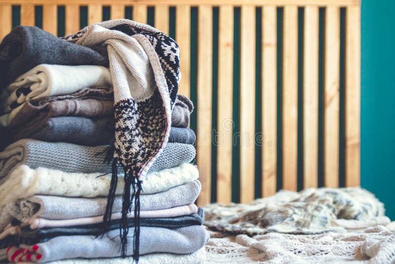 A Stack of Cozy Warm Winter Clothes Lies on the Bed Stock Image Image