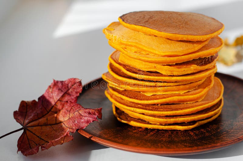 Stack of Delicious Pancakes on a Brown Plate. Healthy Food Stock Photo