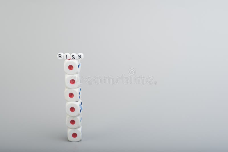 Stack of Dices with the Word Risk on Top Stock Image - Image of cubic ...