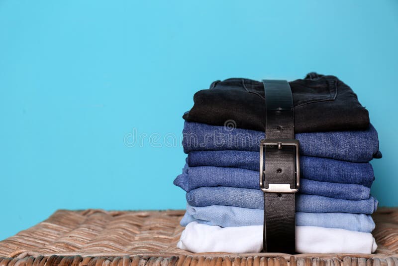 Stack of Different Jeans on Basket Against Color Wal Stock Image Image of apparel, jeans