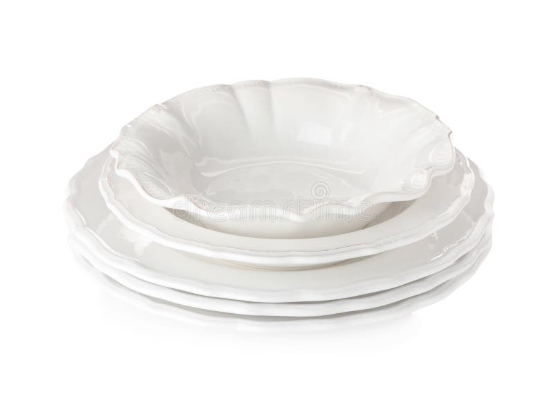 Stack of empty ceramic dishware on white background