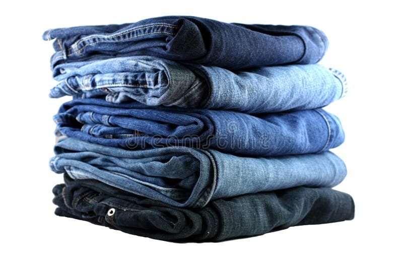 Stack of five blue jeans royalty free stock images