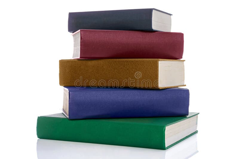 Stack of five hardback books isolated on white