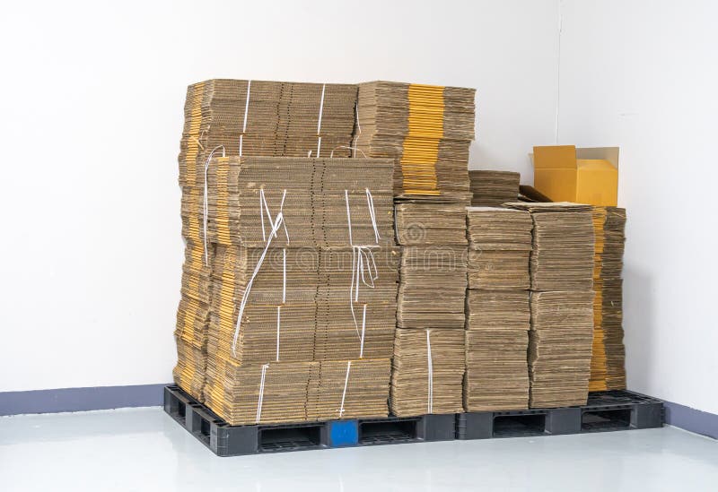 Stack of Flat Pack Cardboard Boxes for Product Packaging Stock Photo