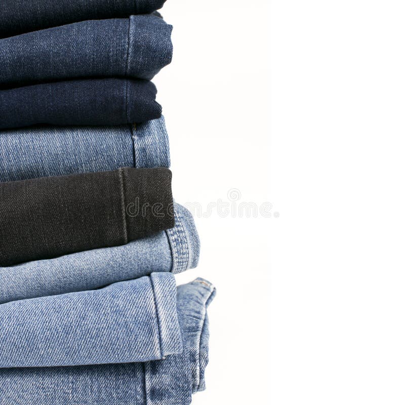 Stack of Folded Blue Jeans on a White Background Stock Image - Image of ...