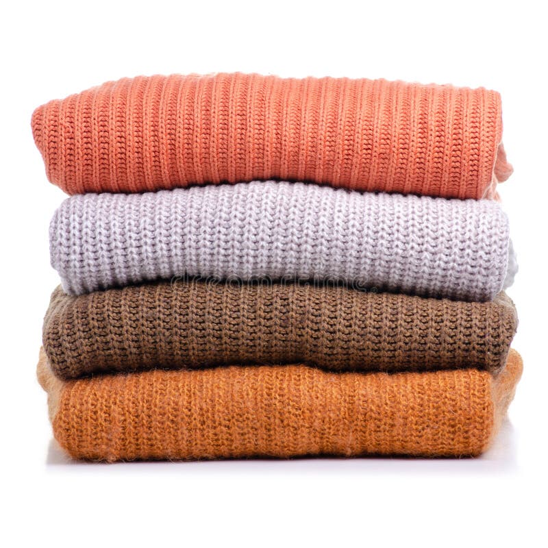 Stack folded sweater clothing stock photos