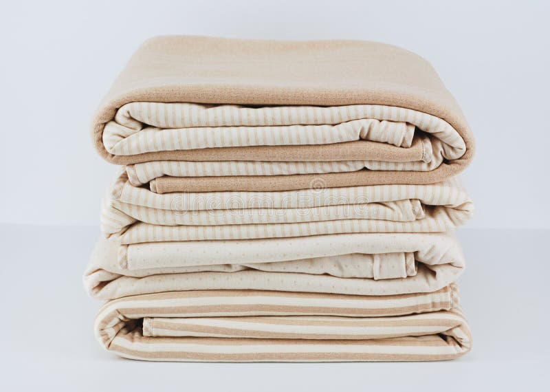 Folded Up Natural Cotton Blanket Stock Image - Image of child, gift
