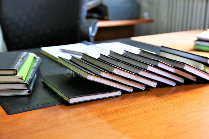 Stack of folders stock photo. Image of laptop, books - 206461852