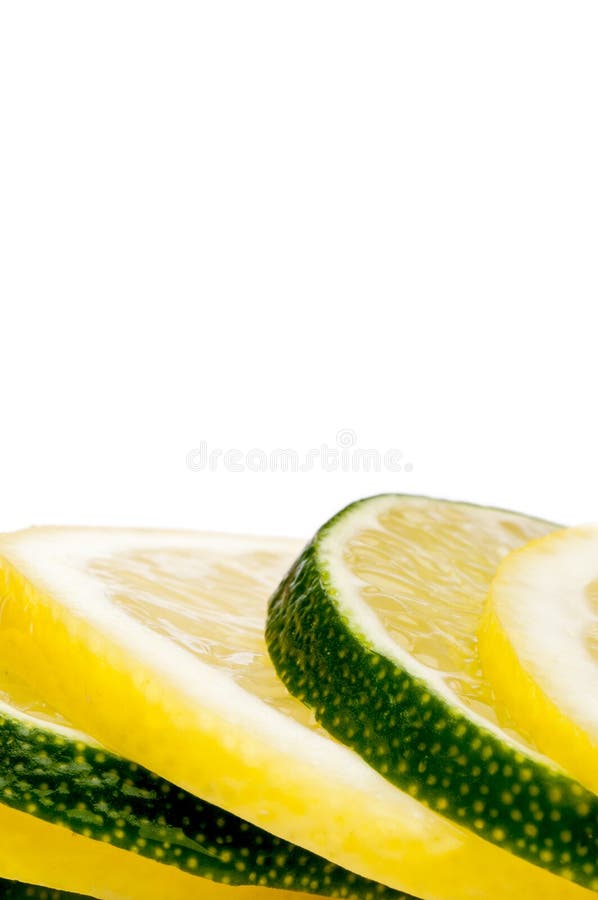 A stack of fresh cut lemon and lime