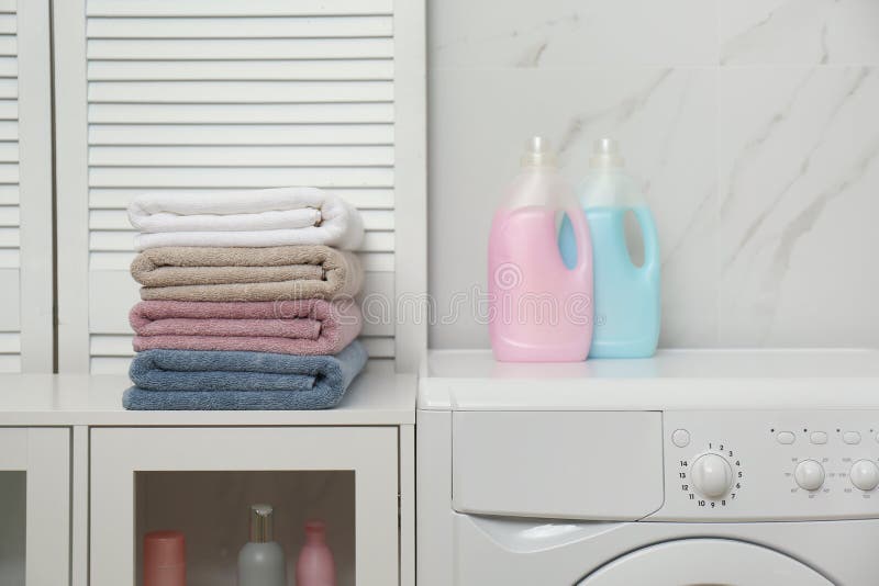 Stack of Fresh Towels and Detergents in Room Stock Photo - Image of