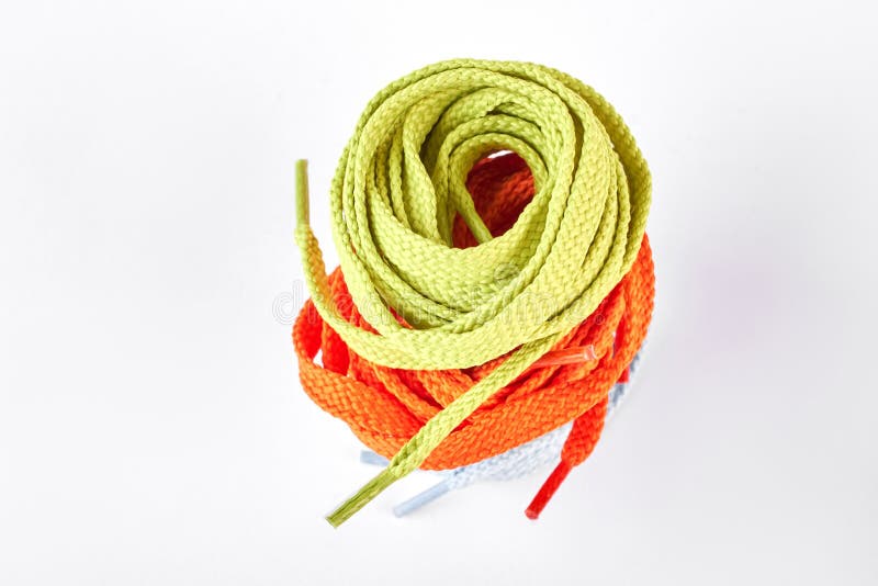 Stack Of Green And Orange Shoe Laces. Stock Photo Image