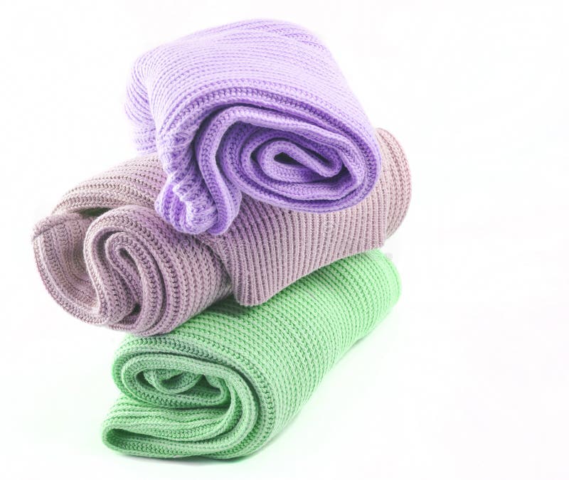 A Stack of Green, Purple, Pink Female Sweaters Isolated on White Stock ...