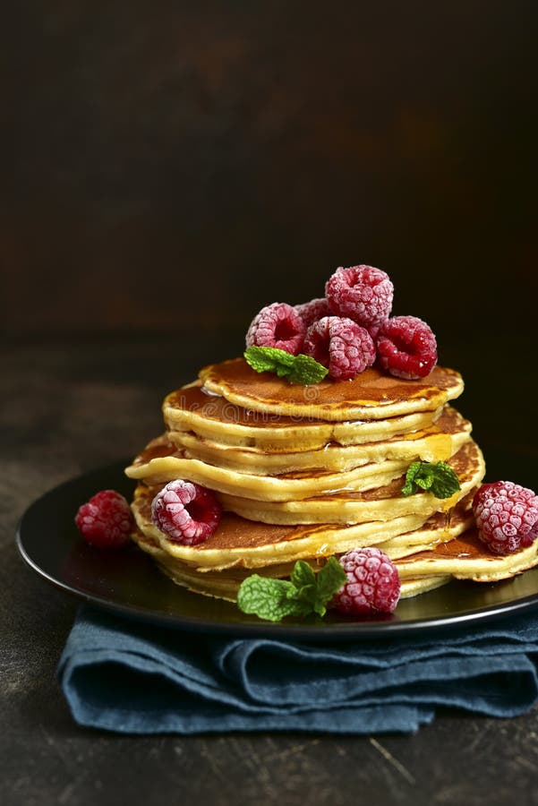 Stack of Homemade Hot Pancakes with Honey and Raspberry Stock Photo ...