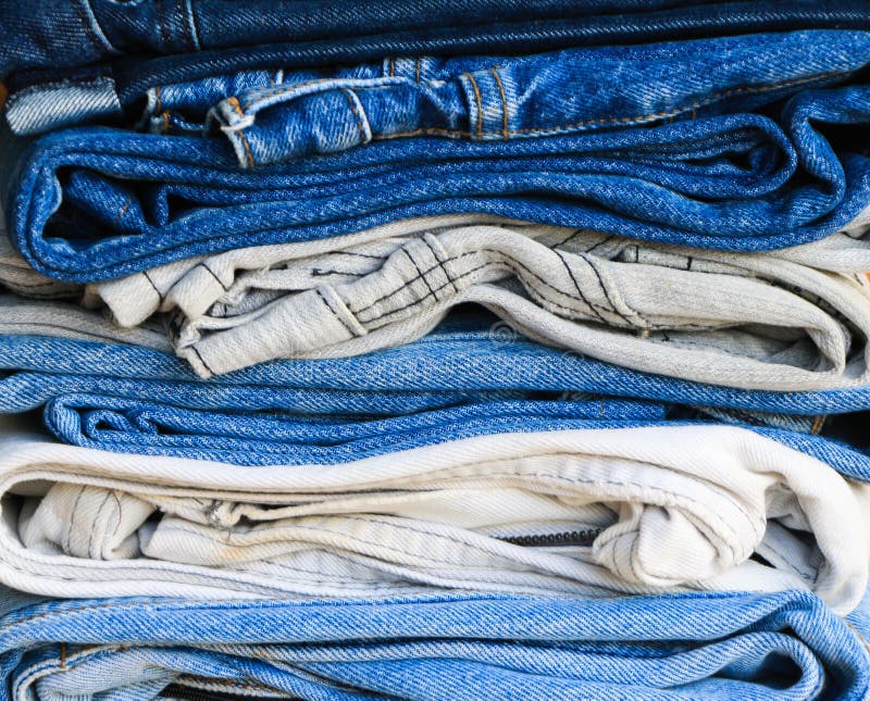 Stack of jeans stock image. Image of dark, casual, light - 110657737