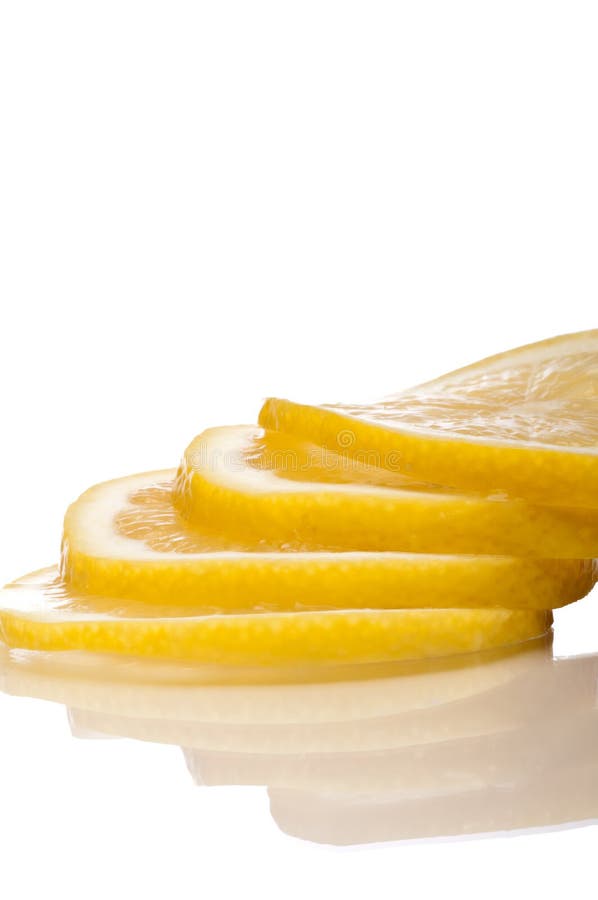 A stack of juicy fresh cut lemon slices