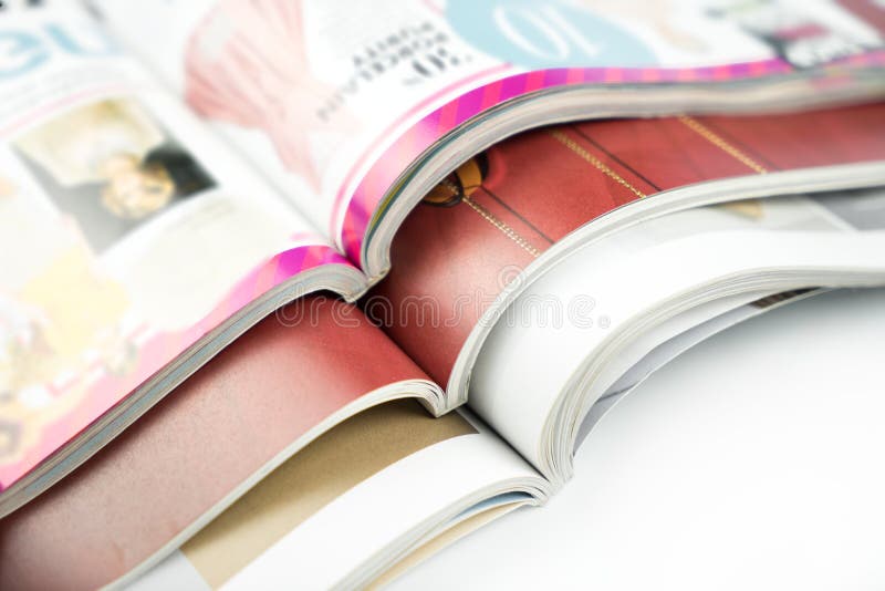 Stack of magazines on  white background