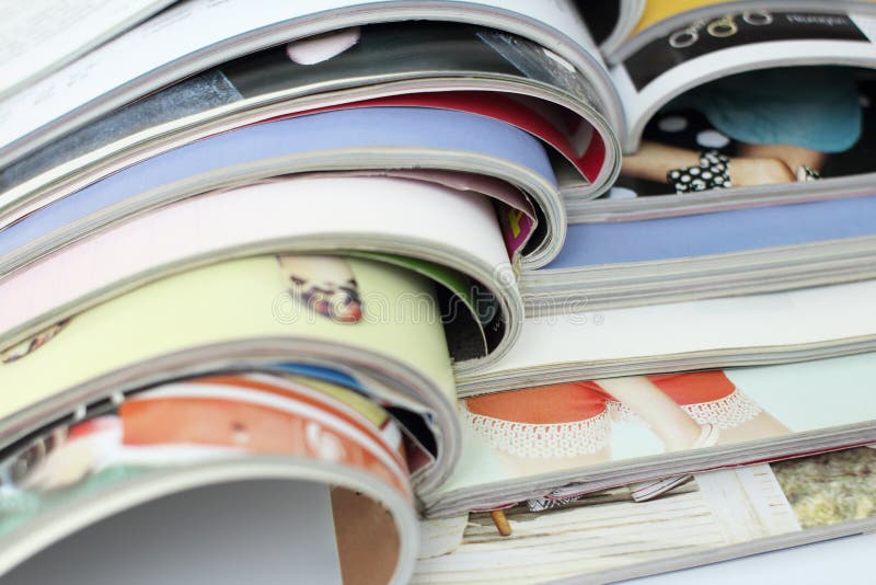 Stack of magazines on white background royalty free stock images