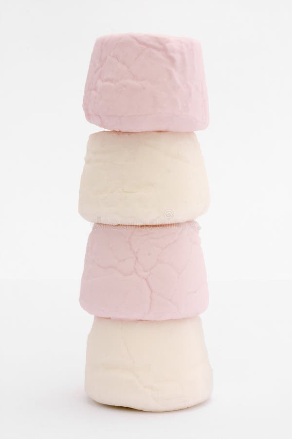 Stack of marshmallows over white