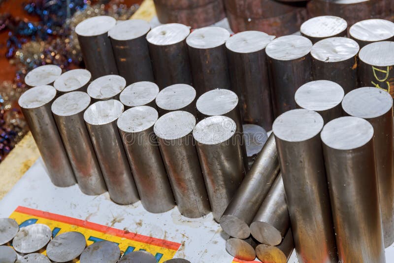 A Stack of Metal Ingots are Cut for Further Processing on a Milling