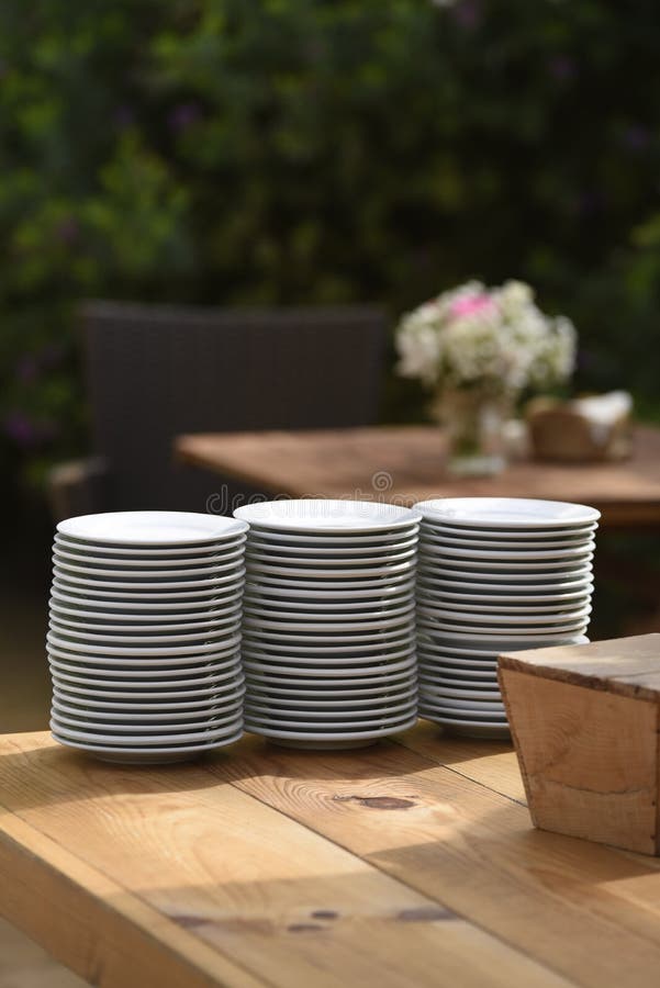 Stack of New Dishes Ready To Serve Lunch at an Outdoor Restaurant Stock Photo Image of pile