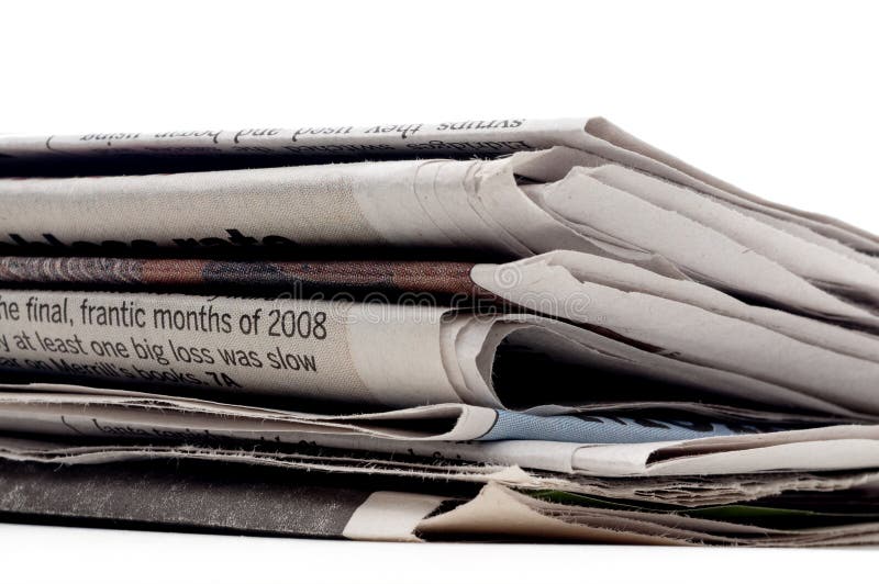 Stack of newpapers on a white background