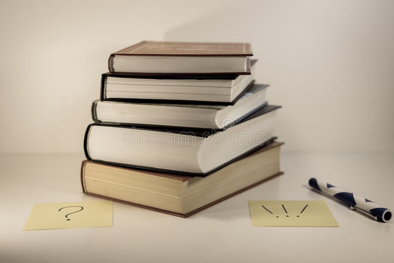 Stack of old books - question and answer royalty free stock photography