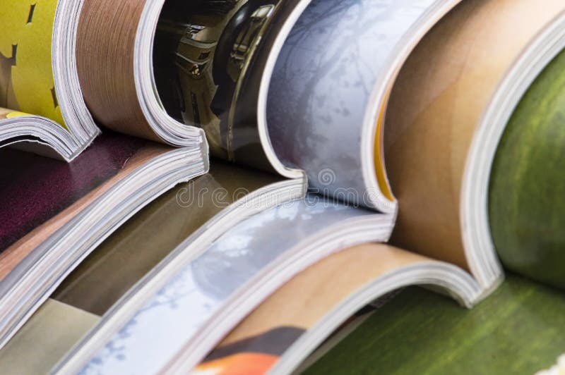 Stack of open magazines