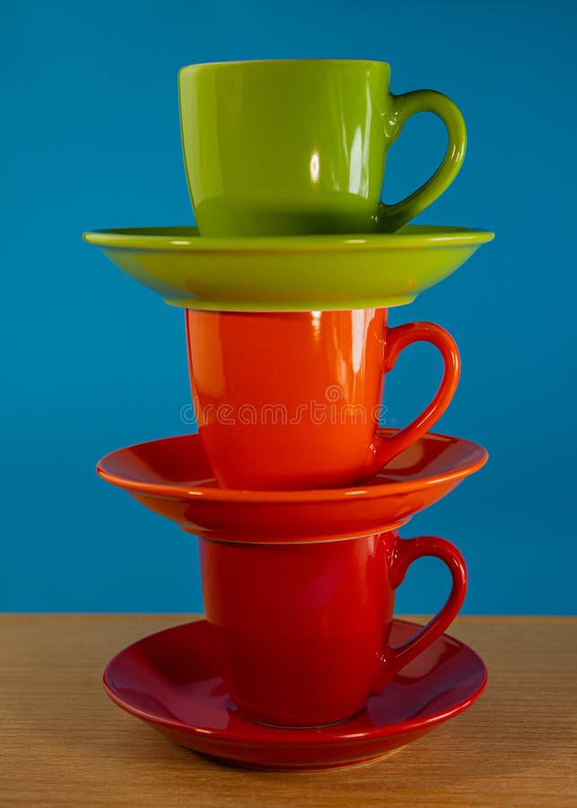 Stack Of Red And Green Tea Cups With Saucers Stock Photo - Download Image  Now - Bright, Brightly Lit, Cafe - iStock