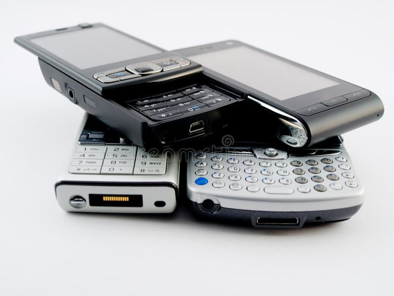 Stack Pile of Several Modern Mobile Phones PDA stock photography