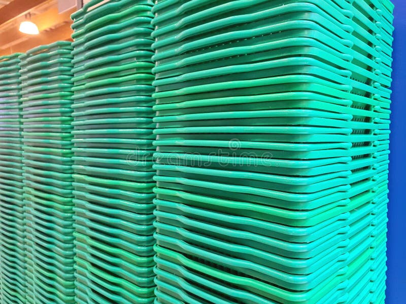 Stack of Plastic Shopping Basket Stock Photo Image of green