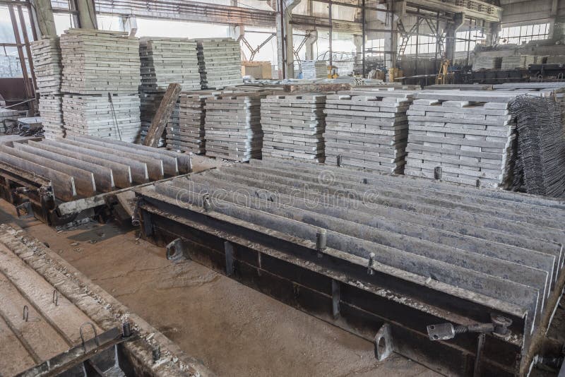 Stack of Precast Reinforced Concrete Slabs in a House-building Factory