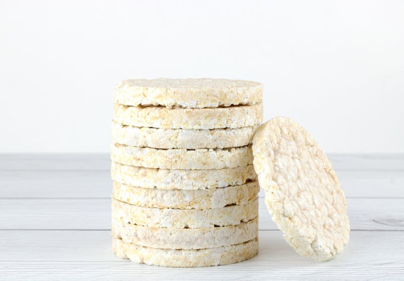 Rice Crackers on a Pink Background, Macro. Cereal Crackers are High in