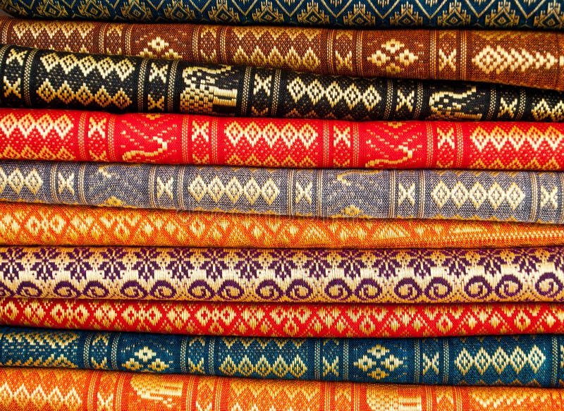 Stack of Thai's traditional pattern silk fabric. Stack of Thai's traditional pattern silk fabric.