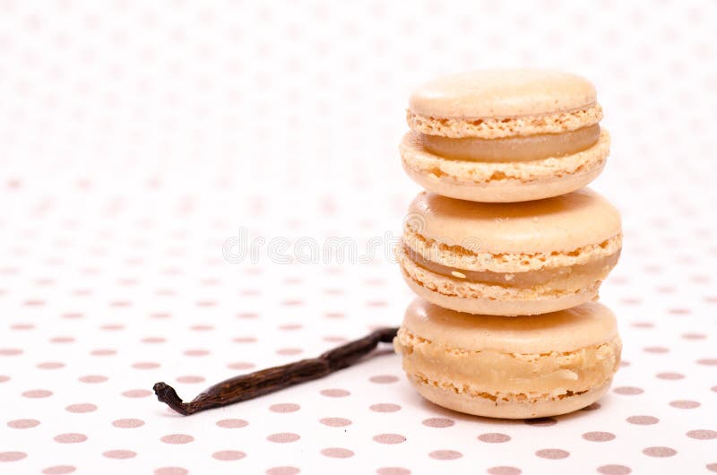 Stack of three macarons with vanilla