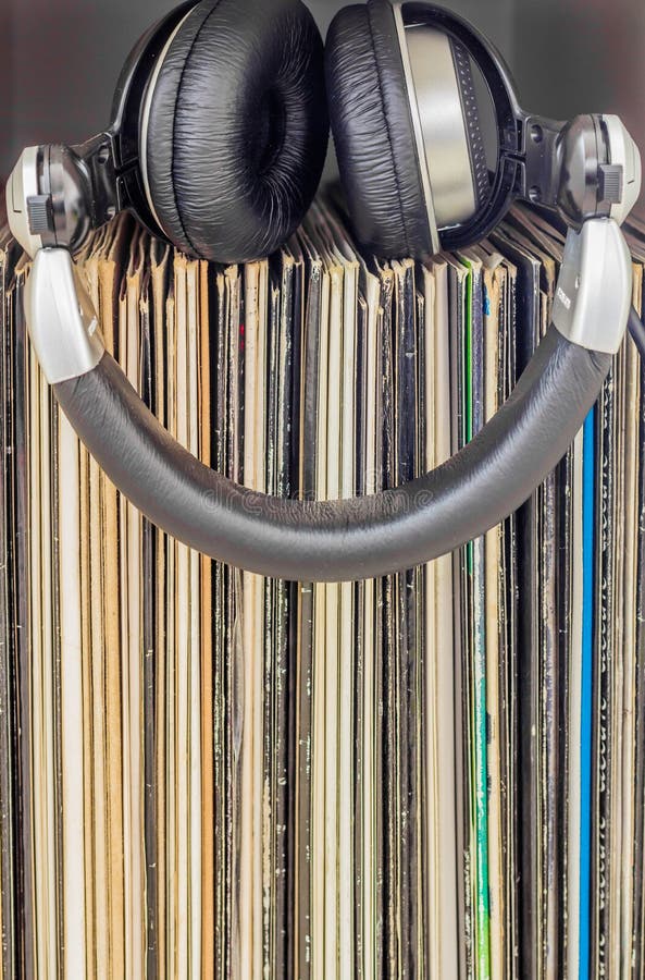 Stack of Vinyl Records with Headphones on Top Stock Image Image of