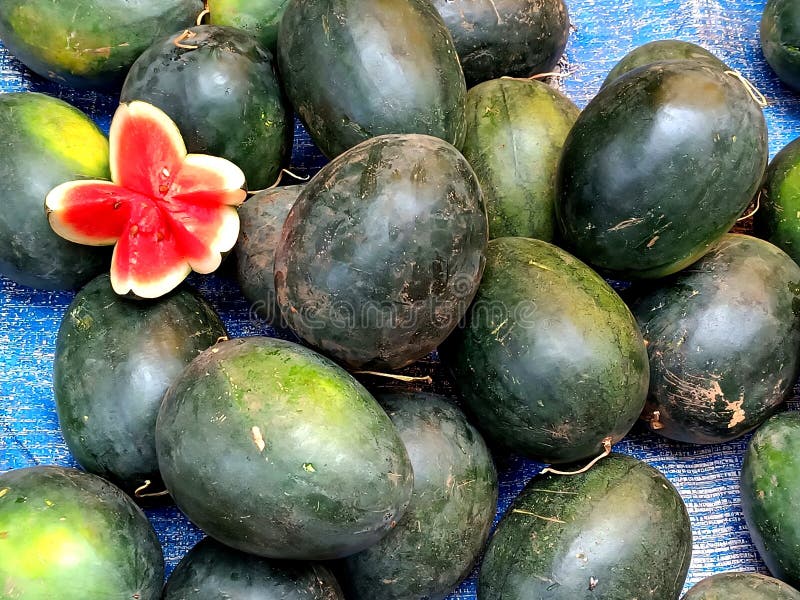 Stack of Watermelon with a Flower Shaped Cut Piece Stock Photo Image of watermelon, tasty