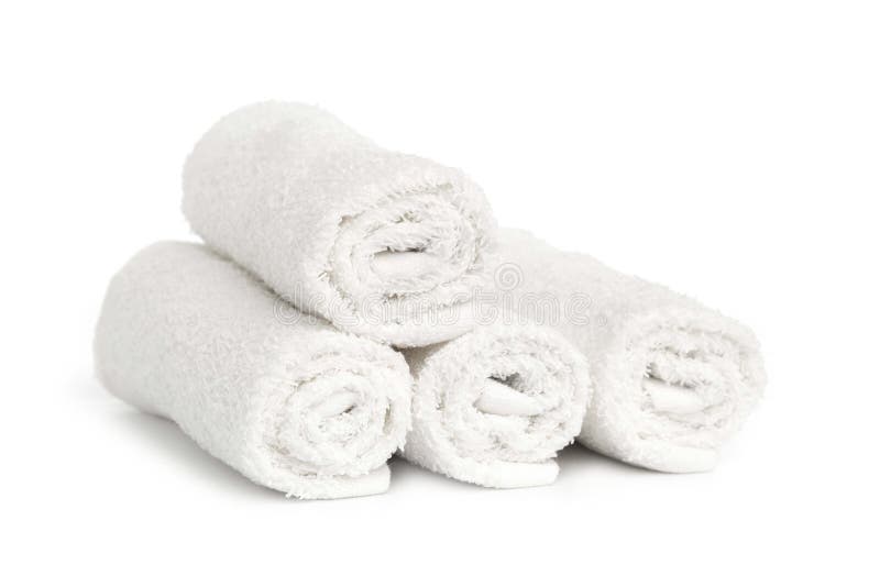 Stack of white clean towels rolled up on white background