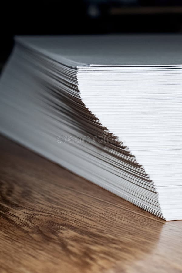 Stack of White Paper for Printer on Gray Background Stock Image