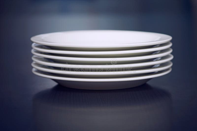 Stack of white plates stock image. Image of pottery, utensil - 25975337