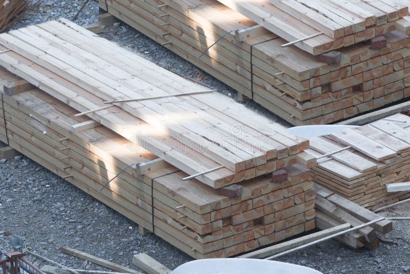 Stack of wooden beams and planks.