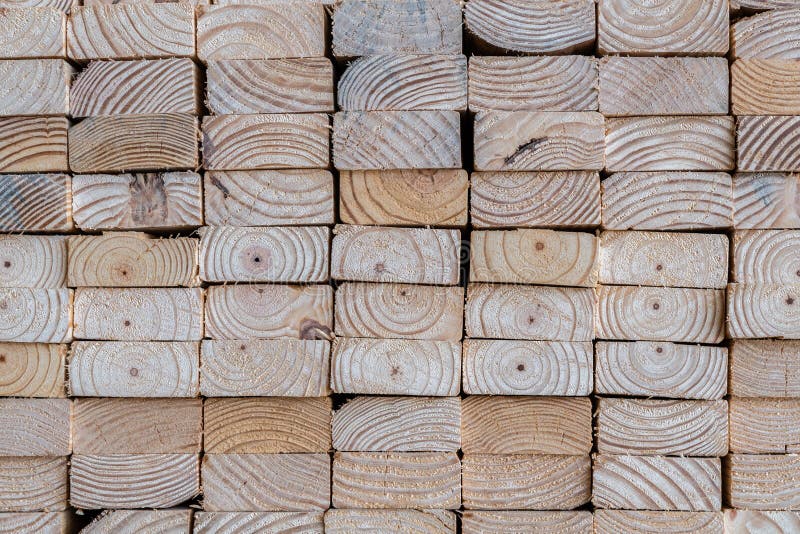 Stack of 2x4 studs in a lumber yard