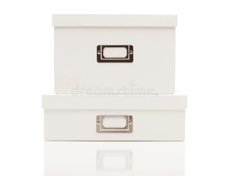 Stacked Blank White File Boxes with Lids on White