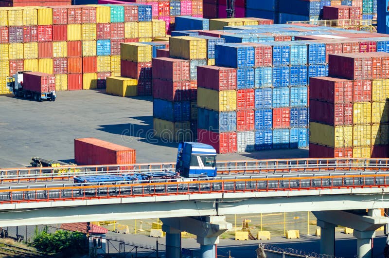 Stacked Cargo Containers in Storage Area of Freight Sea Port Stock