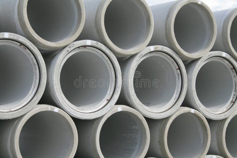 Stacked concrete water pipes. A series of stacked concrete water pipes. Cylindrical and circular in cross section royalty free stock photo Stacked concrete water pipes. A series of stacked concrete water pipes. Cylindrical and circular in cross section royalty free stock photo