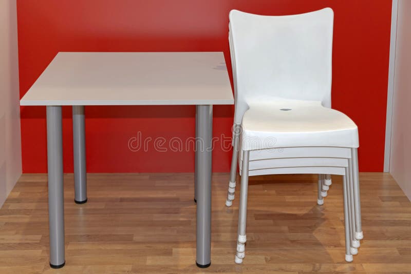 Stacked Chairs Table stock photo. Image of floor, interior 230219894