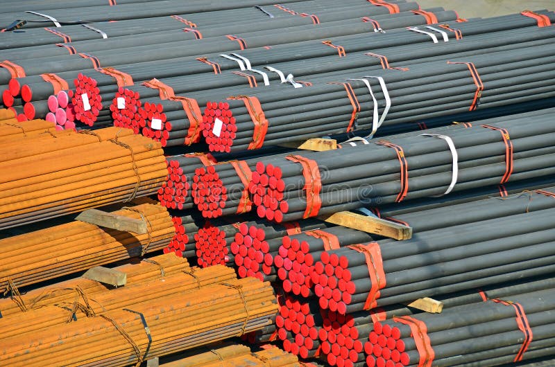 Stacked PVC and steel pipe stock image. Image of industry 25280955