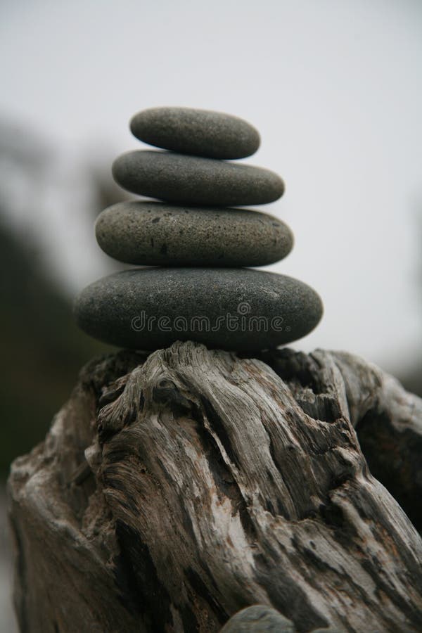 Stacked Rocks at the beach stock photo. Image of tranquility - 193330730